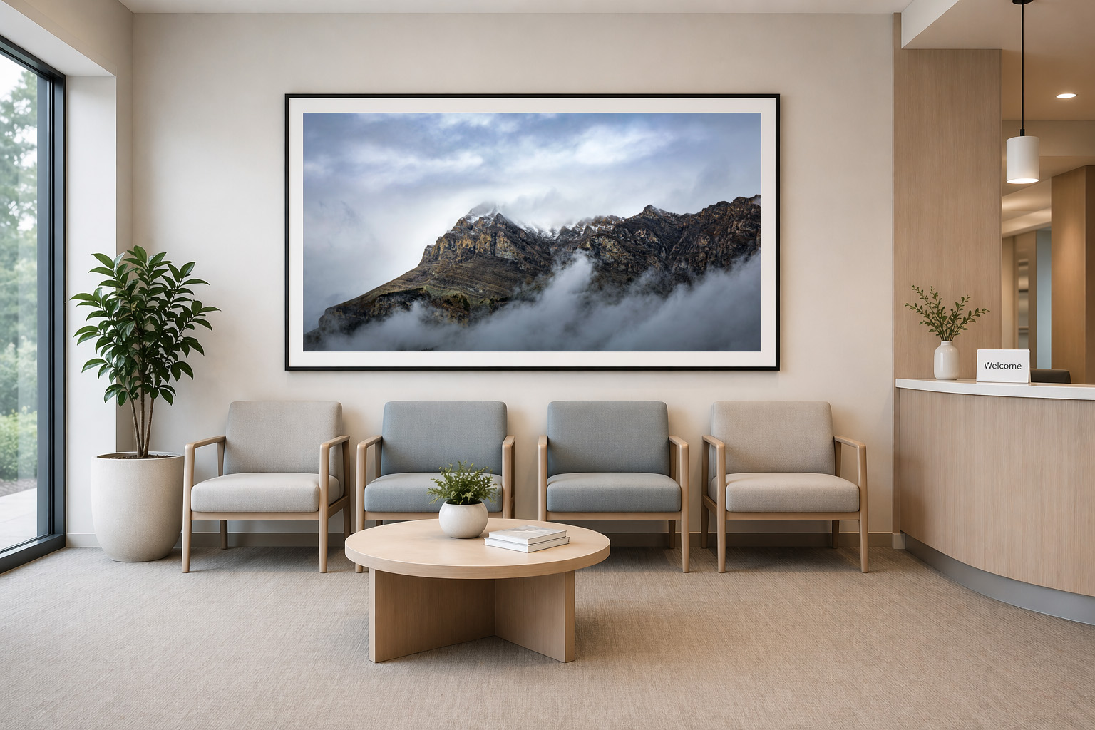 Modern healthcare lobby with large framed mountains in clouds landscape by Dan Sproul — black frame white mat
